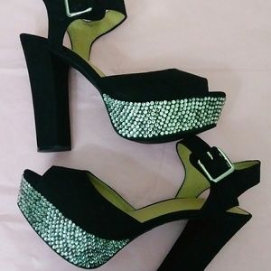 A pair of heels covered in rhinestones